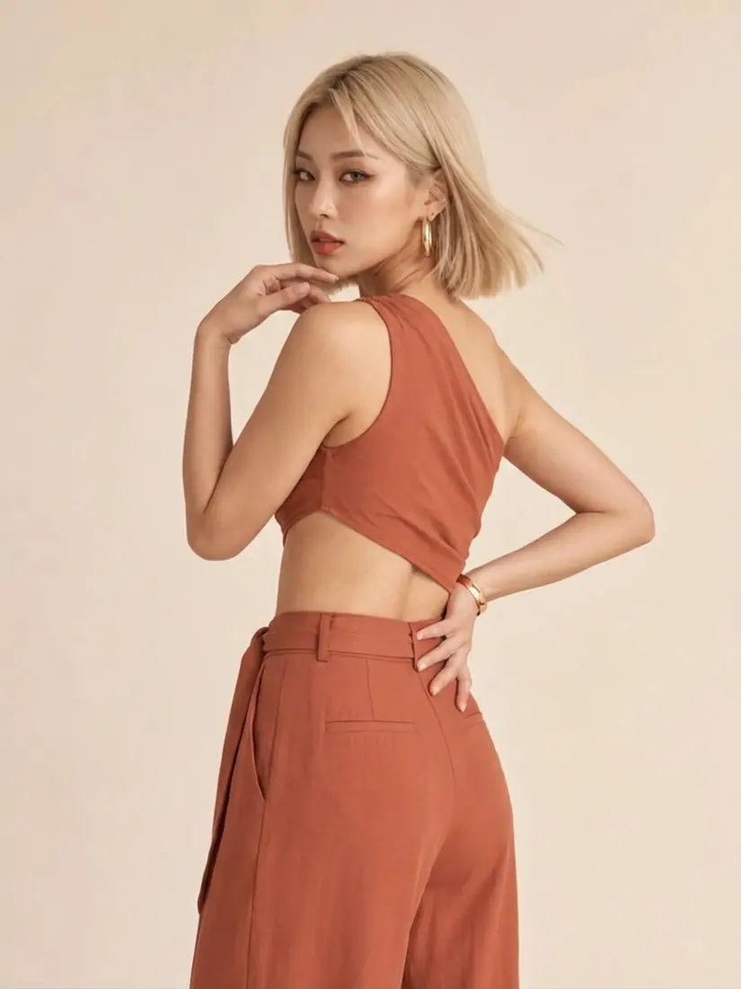 A woman in a rust-colored halter top holds a new side-profile pose set by the Pose Editor tool.