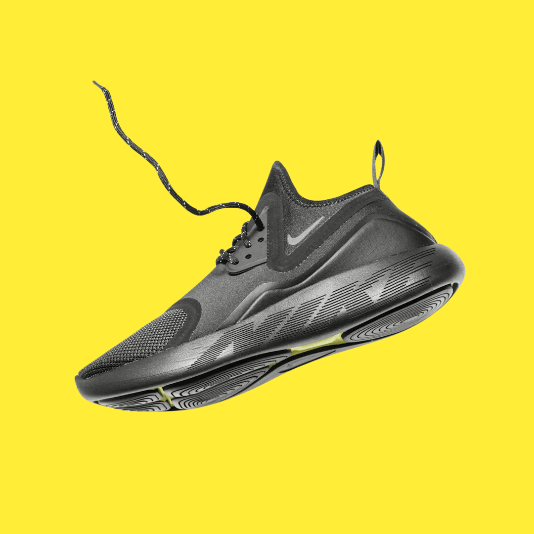 A Nike product photo on a yellow background, created with the Background Changer.