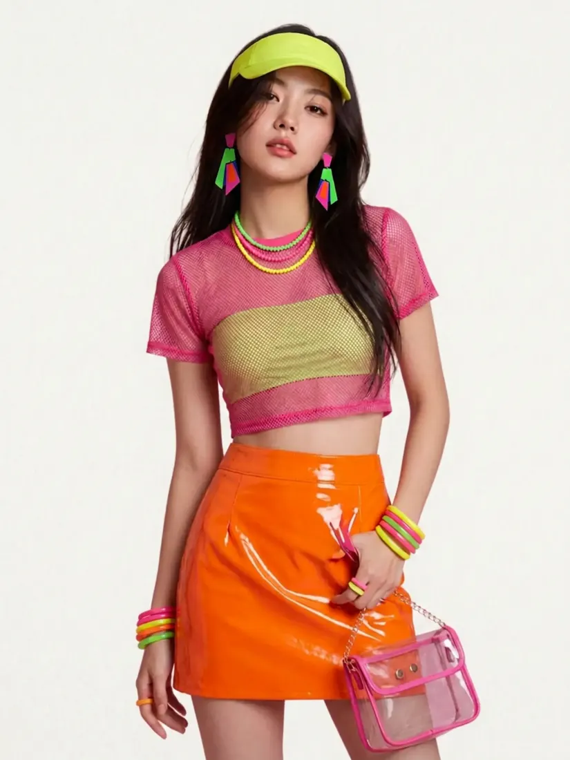 Pink mesh top, orange vinyl skirt and neon accessories