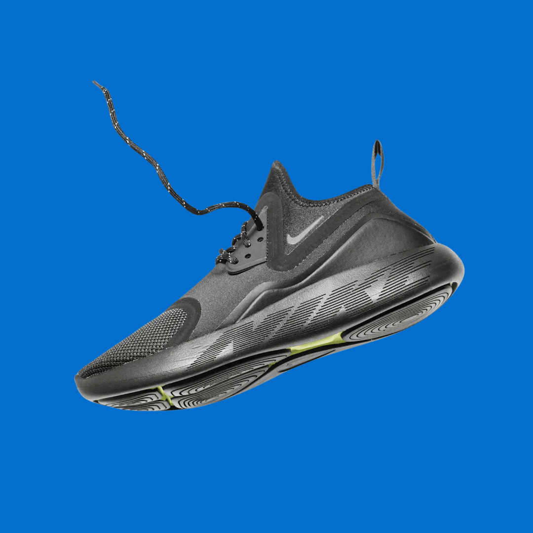 A Nike product photo on a blue background, created with the Background Changer.