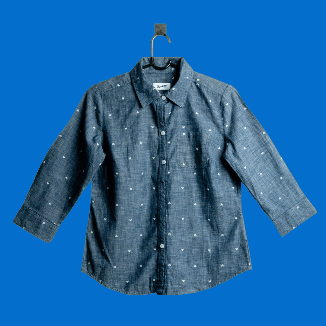 A shirt product photo on a blue background, created with the Background Changer.